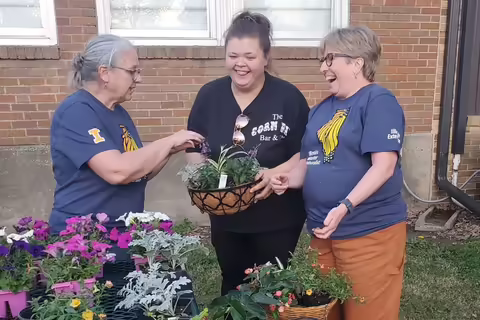 A group of women with plants