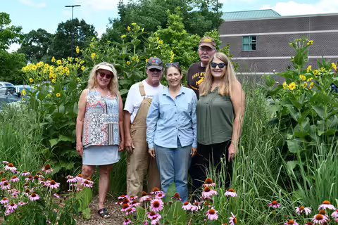 Woman in a native plant garden