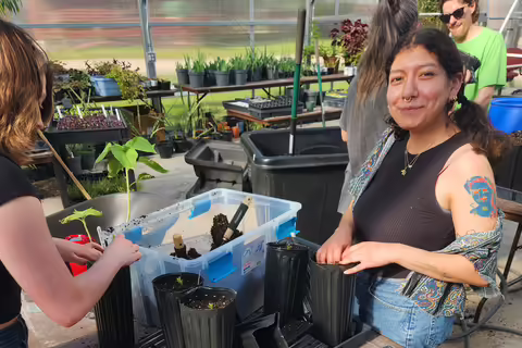 a woman in a greenhouse