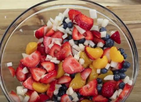 Salad bowl with jicama, blueberries, strawberries, and oranges