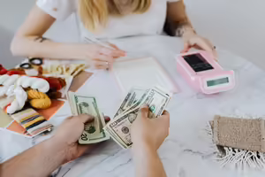 teen working on budgeting money 