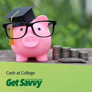 piggy bank wearing a graduation cap