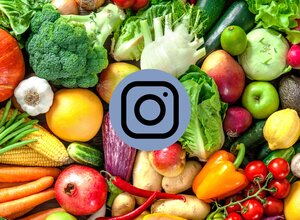 Various fruits and vegetables with Instagram logo in the middle.