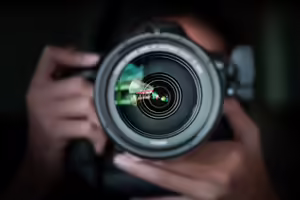 looking into the lends of a camera