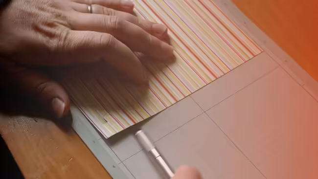 Woman's hand with cricut cutting paper