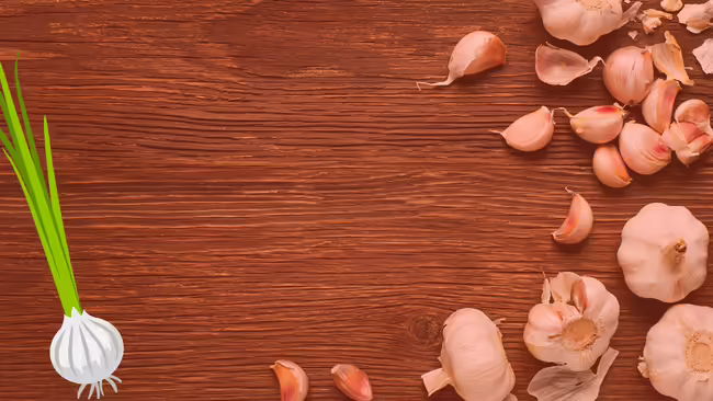 Garlic are laid out across the table