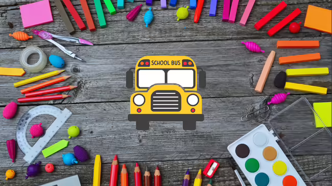 A school bus surrounded by school supplies