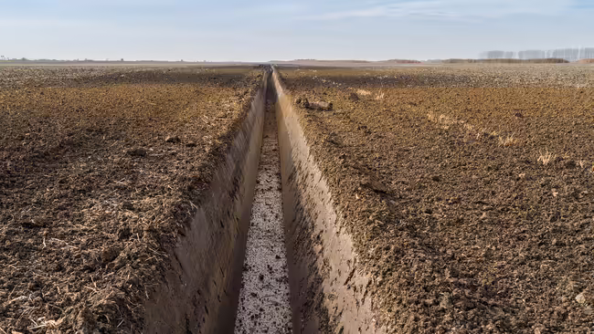 drainage ditch in field