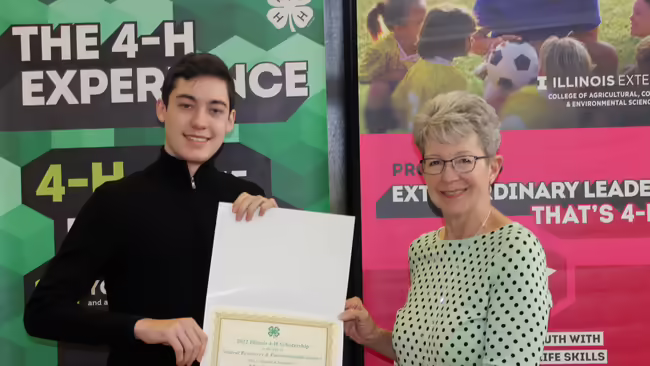 4-H Teen Science Ambassador receiving an award