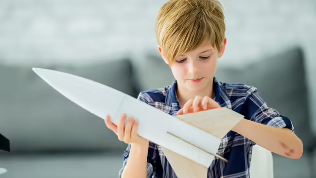 youth building model rocket