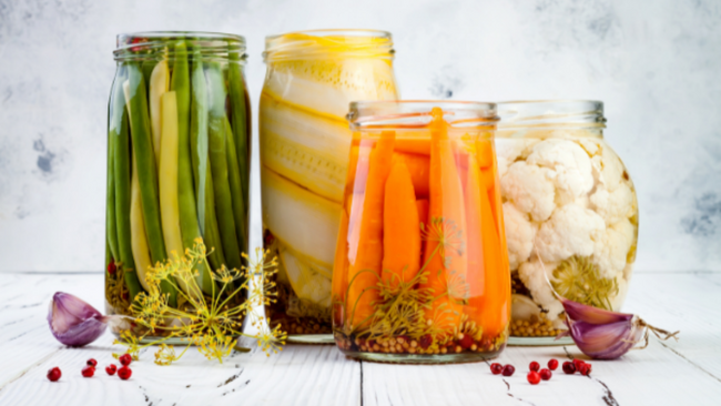 Image of jars of pickles, carrots, and cauliflower