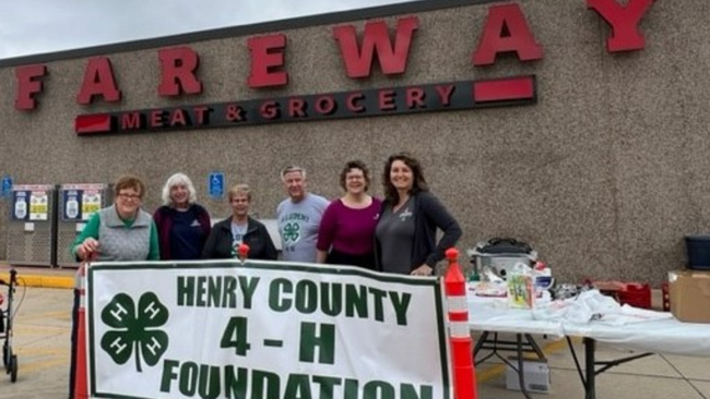 Henry County 4-H Foundation members stand in front of the Fareway store