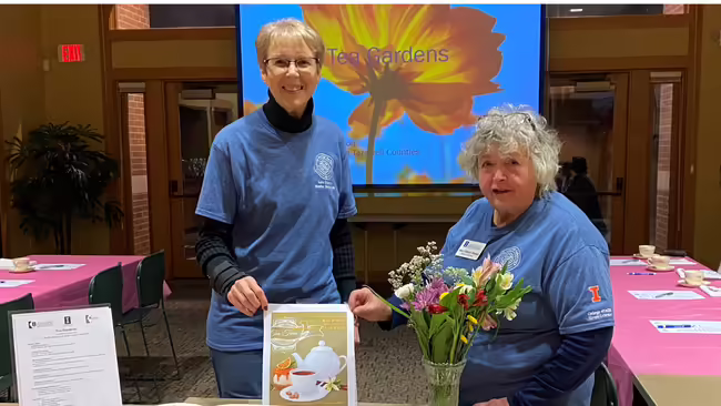 two master gardener women showcasing a program