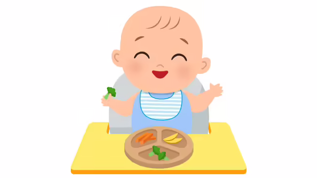 baby with a plate of food