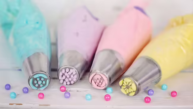 Cake decorating bags with colorful icing