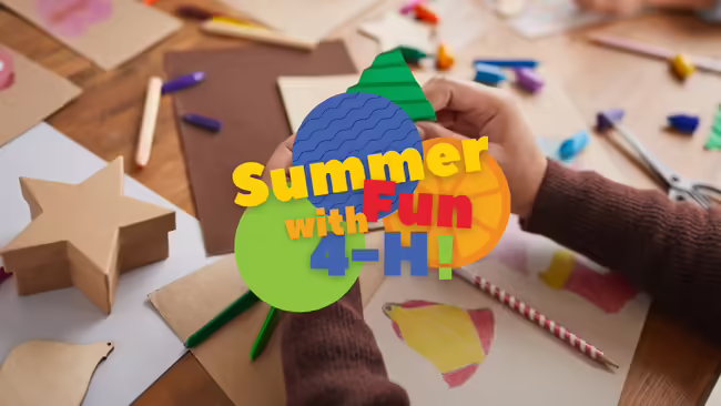 two hands using craft supplies