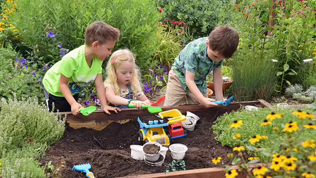 kids playing in a garden
