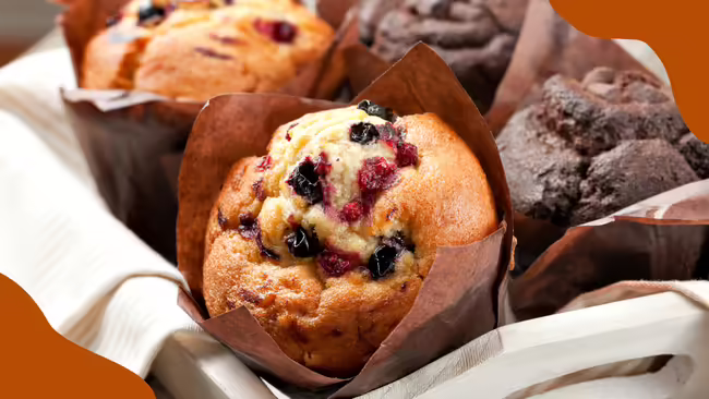 Basket of muffins with brown corner graphics.