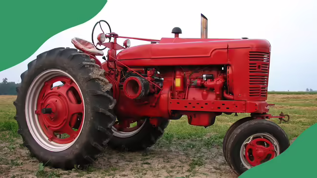 Red tractor with green corner graphics.