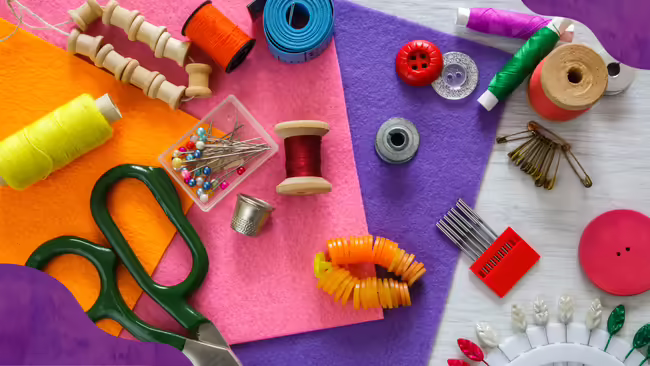 sewing tools laying on top of colorful felt.