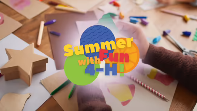 "Summer Fun with 4-H!" in front of craft supplies