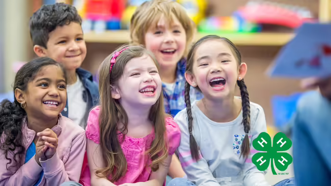 five children laughing at storytime