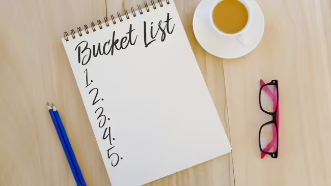 Work on your bucket list at this session: notepad with a list started