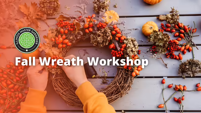 White letters with autumn wreath background
