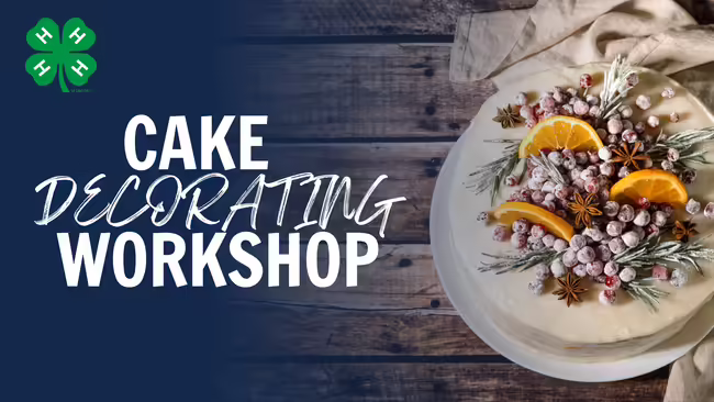Elaborately decorated cake with fruits and garnishes with words "Cake Decorating Workshop"