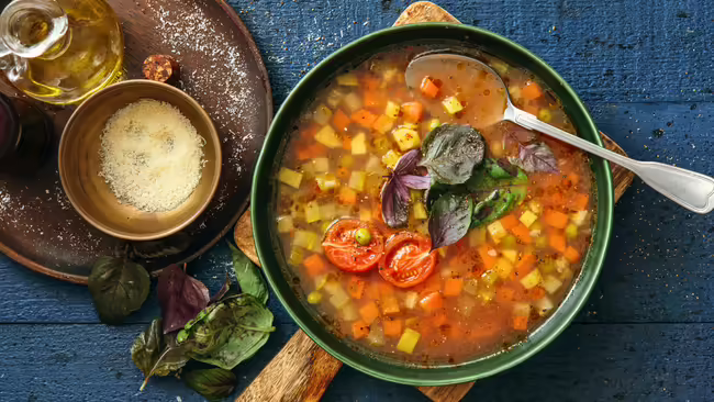 A bowl of soup on a table