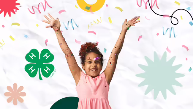 Girl tossing confetti