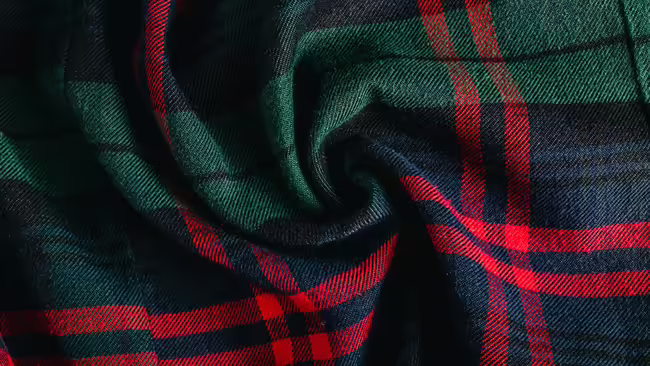 close-up of green, blue, and red flannel material