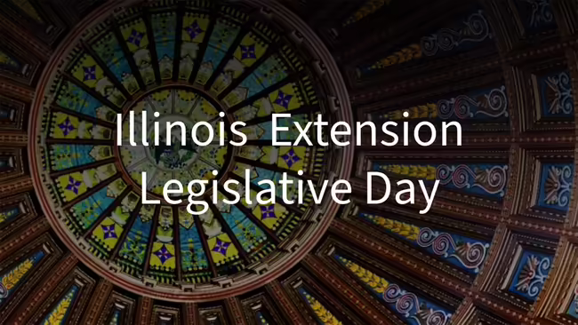 "Illinois Extension Legislative Day" in front of the Illinois capitol dome interior