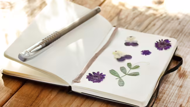 a journal with pressed flowers