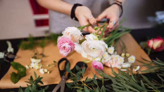 hands working with flowers