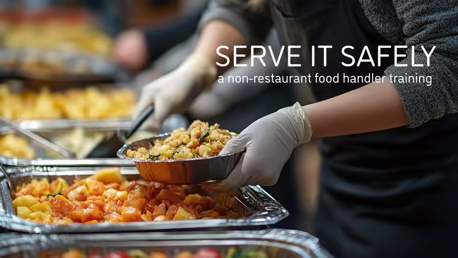 buffet line of food being dished up by hands