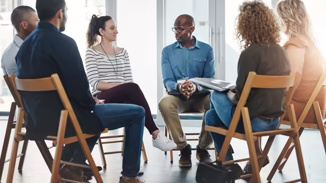 A group of diverse people talking 