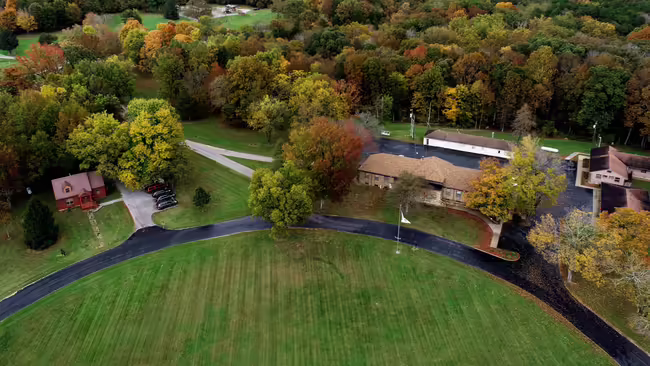 Dixon Springs Ag Center offices with fall foliage surrounding 