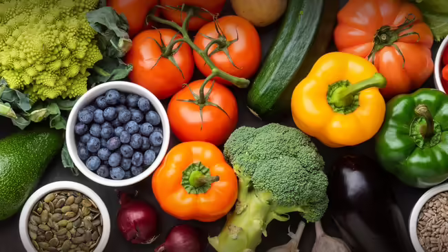 Fresh vegetables, fruits, and seeds close up