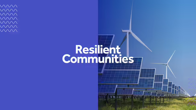 Resilient Communities and field with wind turbine and solar panels