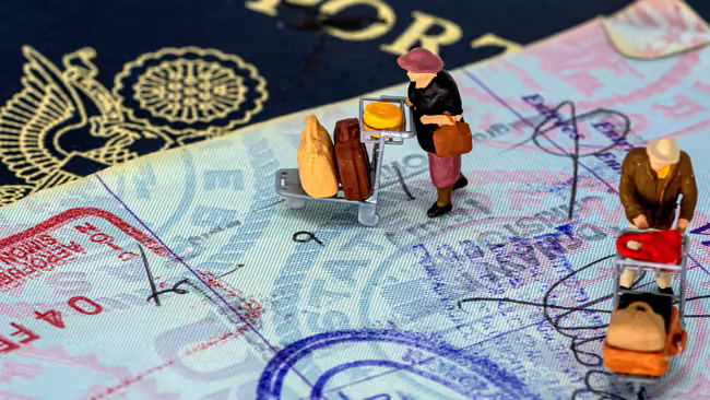 stamped passport with plastic figures on it