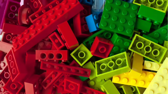 pile of red and green building bricks