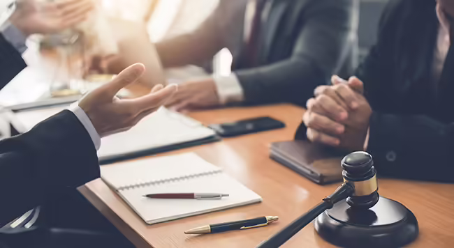 people in a legal meeting