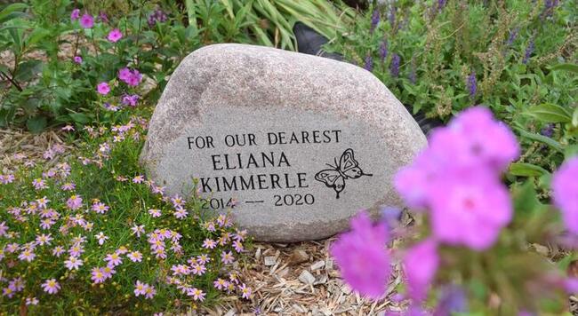 Eliana' Garden memorial rock in her garden