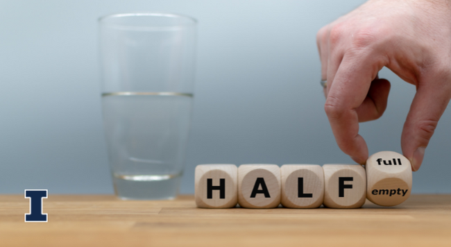 glass half full with water, block with the word half 