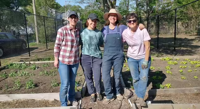 a group of ladies in the garden