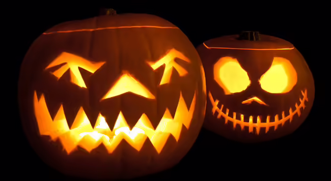 carved jack-o-lantern pumpkins with scary faces