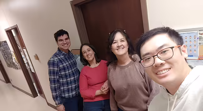 People standing in a hallway