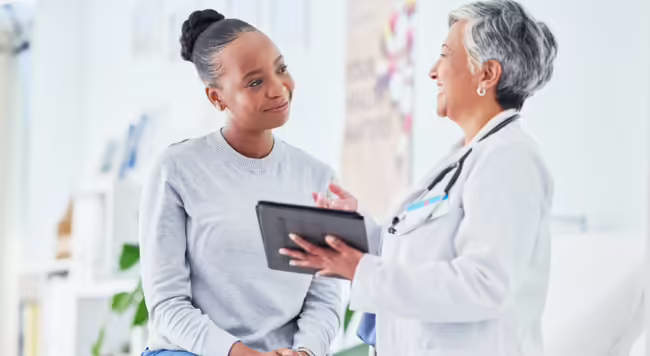 doctor talking to patient