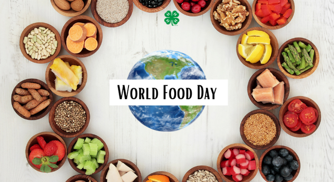 Dishes of food surrounding a globe with the words "World Food Day"